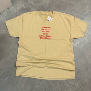 Zumiez Beige T-Shirt with Red and Yellow Accents